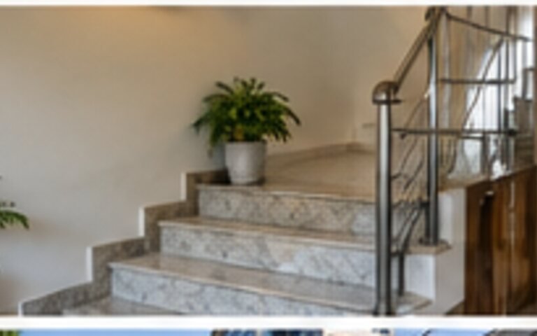 Residential staircase with handrail and clearly visible step edges